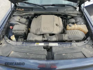 2013 Dodge Challenger R/T z VIN 2C3CDYBT9DH585965, wystawiony jako Copart lot #52995875 z przebiegiem 131 456 mil mil oraz Szkoda całkowita • Salvage title. Historia ofert i sprzedaży dostępna na DreamBid. Obrazek 11.