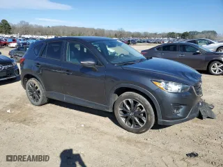 2016 Mazda CX-5 Grand Touring with VIN JM3KE2DY4G0873726, listed as a Copart auction lot 46357725 with 156,658 mi miles and Clean Title. Bid and sale history available at carsss.com. Image 4.