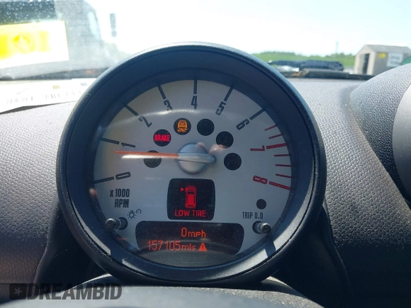 2012 MINI Countryman z VIN WMWZB3C50CWM29681, wystawiony jako IAAI lot #42408117 z przebiegiem 157 105 mil mil oraz . Historia ofert i sprzedaży dostępna na DreamBid. Obrazek 7.