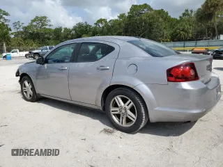 2013 Dodge Avenger SXT with VIN 1C3CDZCB4DN689363, listed as a Copart auction lot 58935055 with 141,536 mi miles and Salvage title. Bid and sale history available at DreamBid. Image 2.
