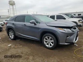 2016 Lexus RX 350 with VIN 2T2BZMCA5GC009122, listed as a Copart auction lot 52448045 with 122,781 mi miles and Salvage Title. Bid and sale history available at DreamBid. Image 4.