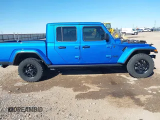 2024 Jeep Gladiator Willys z VIN 1C6HJTAG0RL123040, wystawiony jako IAAI lot #41849222 z przebiegiem 14 989 mil mil oraz . Historia ofert i sprzedaży dostępna na DreamBid. Obrazek 14.