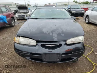 1997 Ford Thunderbird LX z VIN 1FALP62W0VH157636, wystawiony jako Copart lot #57436535 z przebiegiem 120 433 mil mil oraz Szkoda całkowita • Salvage title. Historia ofert i sprzedaży dostępna na DreamBid. Obrazek 5.