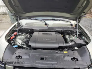 2024 Land Rover Defender S with VIN SALEJ7EX9R2343479, listed as a Copart auction lot 84972984 with 3,124 mi miles and Salvage title. Bid and sale history available at DreamBid. Image 12.