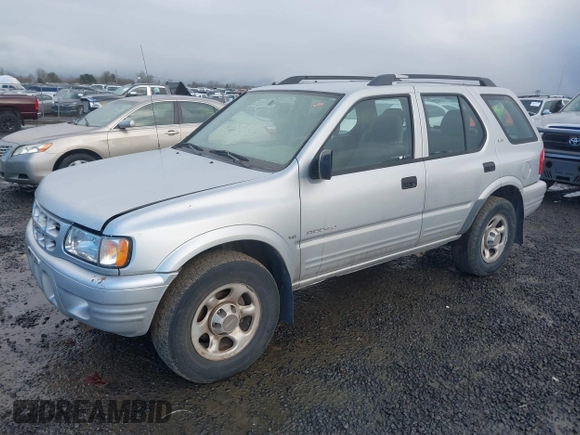 2000 Isuzu Rodeo z VIN 4S2DM58W9Y4301998, wystawiony jako IAAI lot #41265011 z przebiegiem 222 659 mil mil oraz . Historia ofert i sprzedaży dostępna na DreamBid. Obrazek 2.