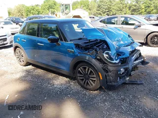 2022 MINI Hardtop 4 Door Cooper S with VIN WMW53DK03N2R85565, listed as a IAAI auction lot 42614714 with 34,289 mi miles and . Bid and sale history available at DreamBid. Image 1.