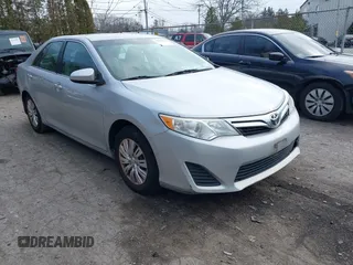 2012 Toyota Camry L with VIN 4T1BF1FK8CU071560, listed as a IAAI auction lot 38211313 with 123,274 mi miles. Bid and sale history available at carsss.com. Image 1.