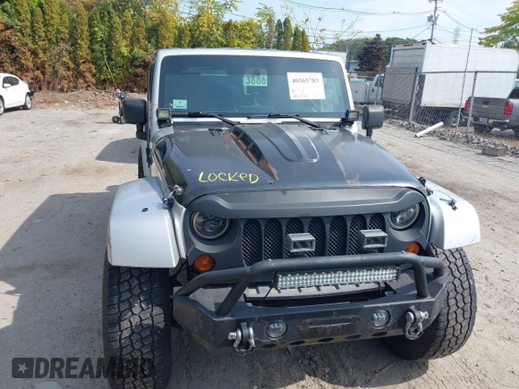 2008 Jeep Wrangler Unlimited Sahara with VIN 1J4GA59158L623784, listed as a IAAI auction lot 40365783 with 185,224 mi miles and . Bid and sale history available at DreamBid. Image 12.