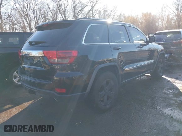 2011 Jeep Grand Cherokee 70th Anniversary with VIN 1J4RR4GT8BC504618, listed as a IAAI auction lot 40993960 with 188,098 mi miles. Bid and sale history available at carsss.com. Image 4.