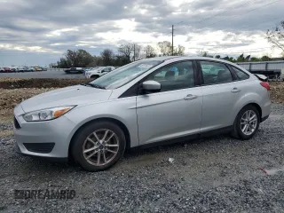 2018 Ford Focus SE with VIN 1FADP3F20JL275641, listed as a Copart auction lot 46580965 with 97,919 mi miles and Salvage Title. Bid and sale history available at carsss.com. Image 1.