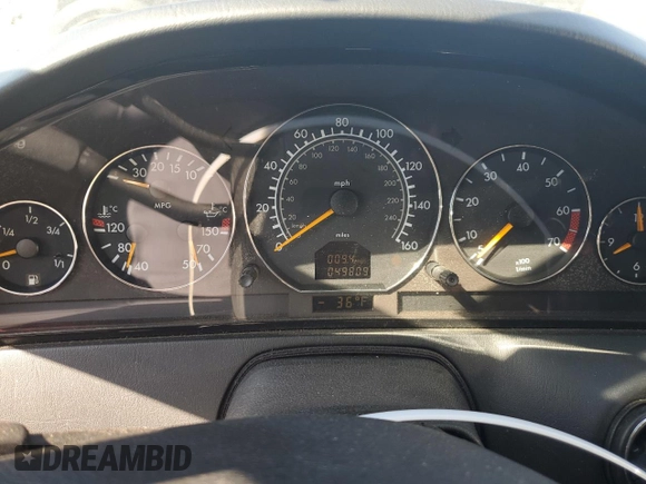 2001 Mercedes-Benz SL 500 with VIN WDBFA68FX1F196609, listed as a Copart auction lot 76124154 with 49,809 mi miles and Salvage title. Bid and sale history available at DreamBid. Image 9.