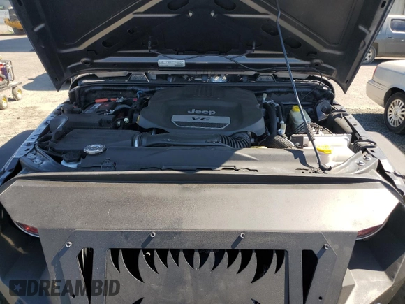 2016 Jeep Wrangler Unlimited Freedom with VIN 1C4BJWDG8GL300314, listed as a Copart auction lot 61044645 with 103,396 mi miles and Clean title. Bid and sale history available at DreamBid. Image 12.