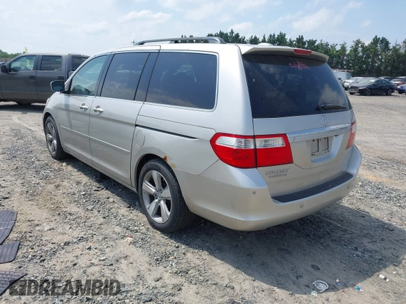 2006 Honda Odyssey Touring z VIN 5FNRL38816B012601, wystawiony jako IAAI lot #42148571 z przebiegiem 278 590 mil mil oraz . Historia ofert i sprzedaży dostępna na DreamBid. Obrazek 3.