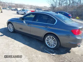 2012 BMW 3 Series 328i with VIN WBA3A5C53CF256338, listed as a IAAI auction lot 41758662 with 99,607 mi miles. Bid and sale history available at carsss.com. Image 3.