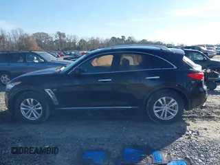 2014 Infiniti QX70 with VIN JN8CS1MU2EM451932, listed as a IAAI auction lot 41439834 with 125,781 mi miles and . Bid and sale history available at DreamBid. Image 14.