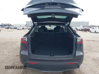 2024 Tesla Model Y Long Range with VIN 7SAYGDEE0RA261489, listed as a IAAI auction lot 41729325 with 5,060 mi miles. Bid and sale history available at carsss.com. Image 20.