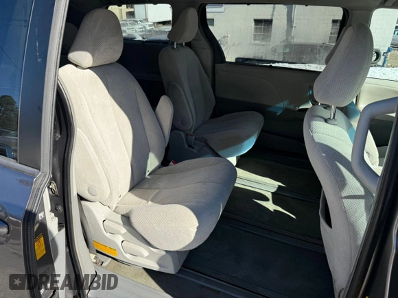 2014 Toyota Sienna LE with VIN 5TDJK3DC4ES074014, listed as a Copart auction lot 43662405 with 284,647 mi miles and Clean Title. Bid and sale history available at DreamBid. Image 5.