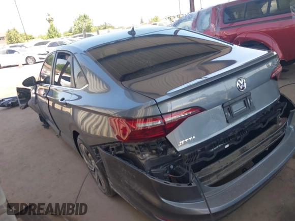 2021 Volkswagen Jetta SEL z VIN 3VWE57BU3MM032442, wystawiony jako IAAI lot #42404802 z przebiegiem 32 927 mil mil oraz . Historia ofert i sprzedaży dostępna na DreamBid. Obrazek 3.