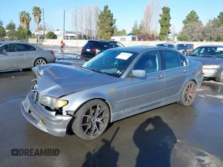 2005 BMW 3 Series 330i with VIN WBAEV53425KM41897, listed as a IAAI auction lot 41818391 with 155,731 mi miles. Bid and sale history available at carsss.com. Image 2.
