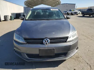 2014 Volkswagen Jetta SE with VIN 3VWD07AJXEM315231, listed as a Copart auction lot 58258075 with 99,860 mi miles and Salvage title. Bid and sale history available at DreamBid. Image 5.