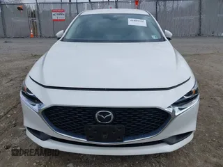 2021 Mazda 3 S with VIN JM1BPAAL6M1310589, listed as a IAAI auction lot 41889766 with 42,325 mi miles and . Bid and sale history available at DreamBid. Image 12.