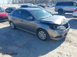 2012 Kia Forte EX with VIN KNAFU4A24C5560114, listed as a IAAI auction lot 41669309 with 236,464 mi miles. Bid and sale history available at carsss.com. Image 1.