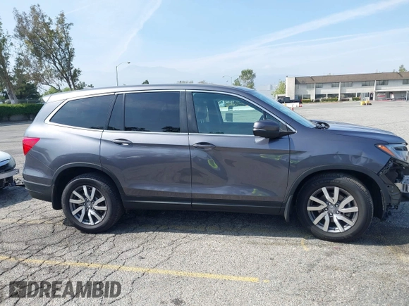 2020 Honda Pilot EX-L z VIN 5FNYF6H50LB047202, wystawiony jako IAAI lot #42117776 z przebiegiem 119 726 mil mil oraz . Historia ofert i sprzedaży dostępna na DreamBid. Obrazek 14.