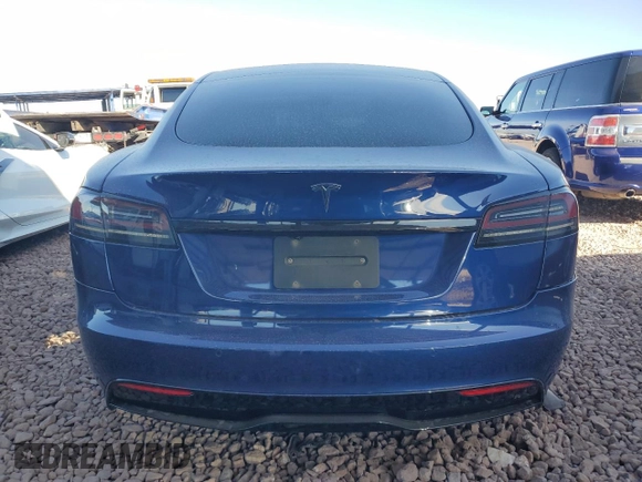 2023 Tesla Model S with VIN 5YJSA1E57PF498760, listed as a Copart auction lot 88494905 with 39,521 mi miles and Salvage title. Bid and sale history available at DreamBid. Image 6.