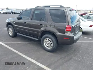 2006 Mercury Mariner Luxury with VIN 4M2YU56186KJ01007, listed as a IAAI auction lot 42619715 with 157,209 mi miles and . Bid and sale history available at DreamBid. Image 3.