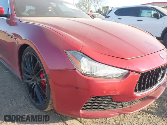 2014 Maserati Ghibli S Q4 z VIN ZAM57RTA1E1126505, wystawiony jako IAAI lot #42115267 z przebiegiem 90 760 mil mil oraz . Historia ofert i sprzedaży dostępna na DreamBid. Obrazek 17.