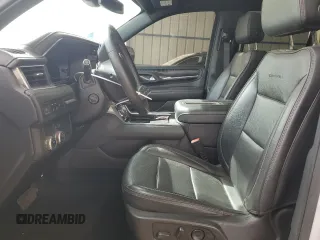 2023 GMC Yukon Denali with VIN 1GKS1DKL1PR239104, listed as a Copart auction lot 47228325 with 64,922 mi miles and Clean Title. Bid and sale history available at carsss.com. Image 7.