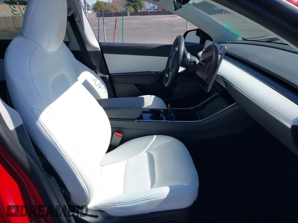 2021 Tesla Model Y Performance with VIN 5YJYGDEF4MF092062, listed as a IAAI auction lot 41583793 with 57,194 mi miles and . Bid and sale history available at DreamBid. Image 5.