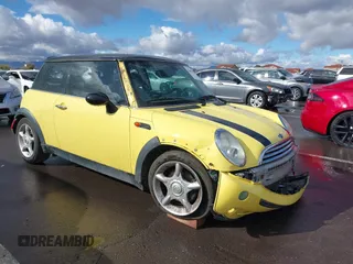 2006 MINI Hardtop with VIN WMWRC33516TJ74140, listed as a IAAI auction lot 41696387 with 161,239 mi miles and . Bid and sale history available at DreamBid. Image 1.