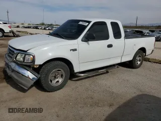 2003 Ford F-150 XL z VIN 1FTRX17233NB92067, wystawiony jako Copart lot #57986555 z przebiegiem 179 101 mil mil oraz Szkoda całkowita • Salvage title. Historia ofert i sprzedaży dostępna na DreamBid. Obrazek 1.