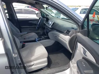 2016 Honda Pilot LX with VIN 5FNYF5H10GB044006, listed as a IAAI auction lot 42075404 with 129,642 mi miles and . Bid and sale history available at DreamBid. Image 5.