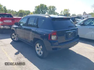 2014 Jeep Compass Sport with VIN 1C4NJCBB0ED660610, listed as a IAAI auction lot 40506737 with 209,670 mi miles. Bid and sale history available at carsss.com. Image 3.