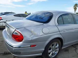 2003 Jaguar S-Type with VIN SAJEA01T83FM48713, listed as a IAAI auction lot 41402152 with 142,875 mi miles and . Bid and sale history available at DreamBid. Image 6.