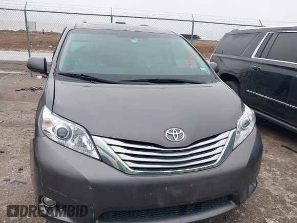 2011 Toyota Sienna XLE AAS with VIN 5TDYK3DC9BS158209, listed as a IAAI auction lot 42163526 with 107,385 mi miles and . Bid and sale history available at DreamBid. Image 13.