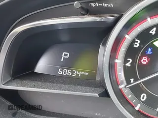 2016 Mazda 3 S Grand Touring z VIN JM1BM1N37G1351062, wystawiony jako IAAI lot #41573775 z przebiegiem 68 634 mil mil oraz . Historia ofert i sprzedaży dostępna na DreamBid. Obrazek 15.