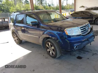 2013 Honda Pilot Touring with VIN 5FNYF4H95DB079782, listed as a IAAI auction lot 42737391 with 152,830 mi miles and . Bid and sale history available at DreamBid. Image 1.