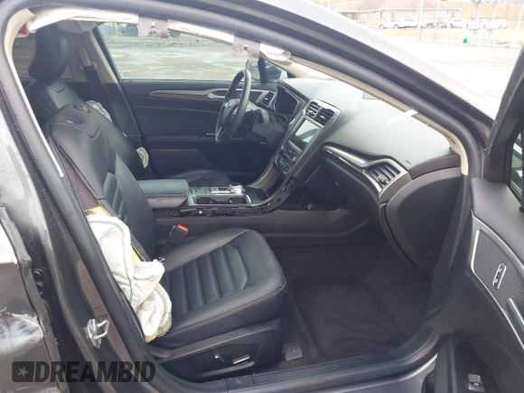 2019 Ford Fusion SEL with VIN 3FA6P0CD6KR141832, listed as a IAAI auction lot 41800102 with 142,282 mi miles and . Bid and sale history available at DreamBid. Image 5.