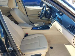 2012 BMW 3 Series 328i with VIN WBA3A5C58CF256254, listed as a IAAI auction lot 41676209 with 68,893 mi miles. Bid and sale history available at carsss.com. Image 5.