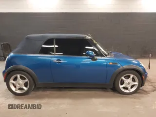 2005 MINI Convertible with VIN WMWRF33555TF63632, listed as a IAAI auction lot 42166640 with 102,559 mi miles and . Bid and sale history available at DreamBid. Image 13.