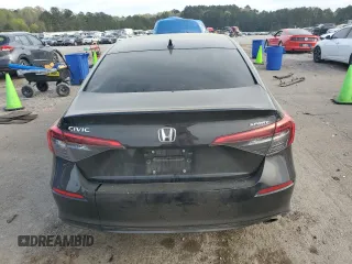 2022 Honda Civic Sport z VIN 2HGFE2F52NH534051, wystawiony jako Copart lot #50697535 z przebiegiem 122 655 mil mil oraz Szkoda całkowita • Salvage title. Historia ofert i sprzedaży dostępna na DreamBid. Obrazek 6.
