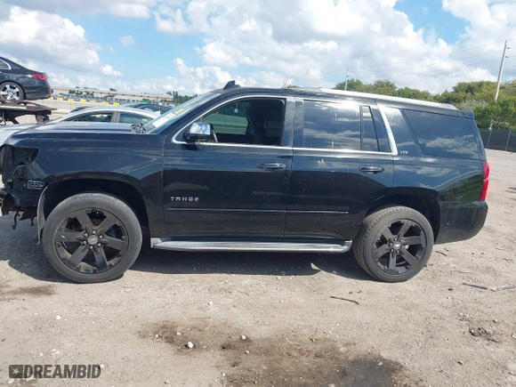 2015 Chevrolet Tahoe LTZ with VIN 1GNSCCKC7FR746028, listed as a IAAI auction lot 41674775 with 198,067 mi miles. Bid and sale history available at carsss.com. Image 15.