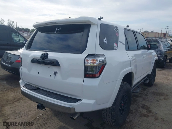 2019 Toyota 4Runner SR5 with VIN JTEBU5JR4K5659014, listed as a IAAI auction lot 41915237 with 90,376 mi miles. Bid and sale history available at carsss.com. Image 4.