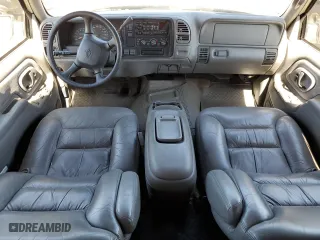 1999 Chevrolet Tahoe with VIN 3GNEK18R5XG184695, listed as a Copart auction lot 67697224 with 135,316 mi miles and Salvage Title. Bid and sale history available at carsss.com. Image 8.