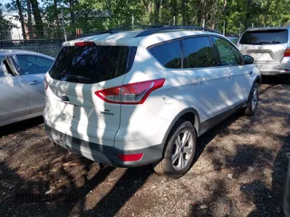 2013 Ford Escape SE with VIN 1FMCU0GX4DUC68046, listed as a IAAI auction lot 42839369 with 185,429 mi miles and . Bid and sale history available at DreamBid. Image 4.