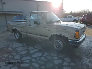 1989 Ford Ranger XL with VIN 1FTCR10AXKUC35082, listed as a Copart auction lot 42209825 with 754,095 mi miles and Salvage title. Bid and sale history available at DreamBid. Image 4.