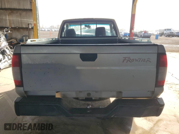 1998 Nissan Frontier XE with VIN 1N6DD21S1WC329392, listed as a Copart auction lot 73609304 with Not provided miles and Salvage title. Bid and sale history available at DreamBid. Image 6.